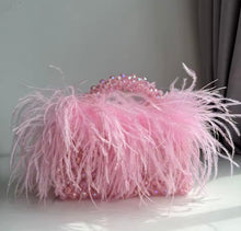 The Halo Feather Clutch
