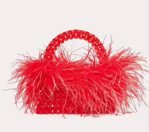 The Halo Feather Clutch
