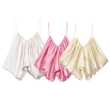 Three satin slip dresses in white, pink, and beige on a white background.Discover The Élise Silk Camisole by BellaRose Couture — a luxury satin cami designed with a soft draped silhouette for effortless, old-money elegance. Available in Ivory, Rose Blush, and Champagne.
luxury camisole

silk satin cami

old money fashion

elegant women’s tops

quiet luxury clothing

BellaRose Couture

satin camisole women

minimalist luxury top