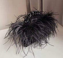 The Halo Feather Clutch