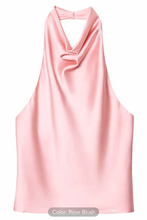 Pink halter top on a white background.Rose blush luxury satin halter top with soft drape and timeless old money style