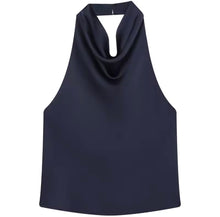 Navy blue halter top on a white background. navy blue silk satin halter top with refined draped neckline and timeless old money elegance