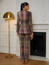 Sophisticated women’s plaid power suit with tailored silhouette and wide leg trousers