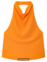 Orange halter top on a white background