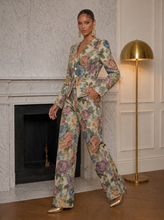     Luxury women’s floral matching set featuring a structured blazer and wide leg trousers